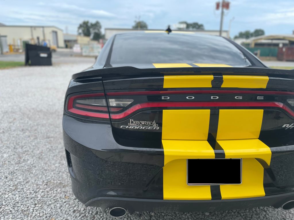 Black Dodge Charger RT with Yellow Racing Stripes