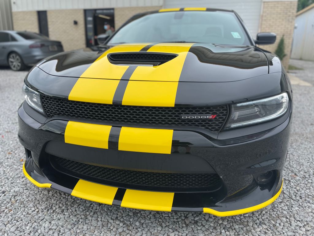 Black Dodge Charger RT with Yellow Racing Stripes