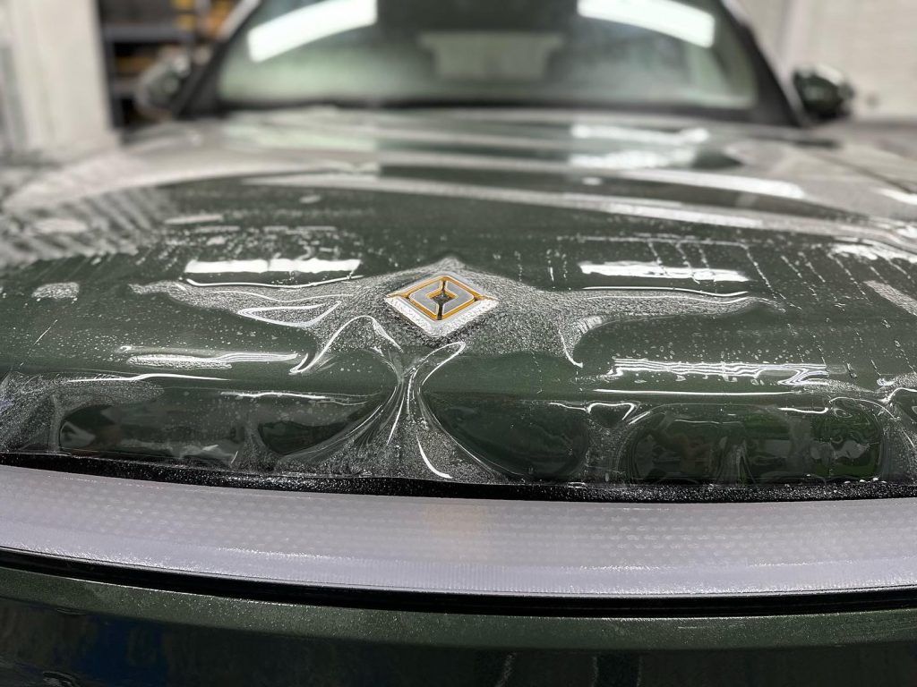 Forest green Rivian R1T with Xpel Ultimate Plus paint protection film