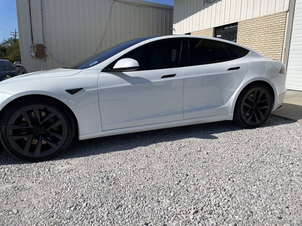 White Tesla Model S with Xpel Prime XR Plus window tint at Prestige Films in Lafayette, LA