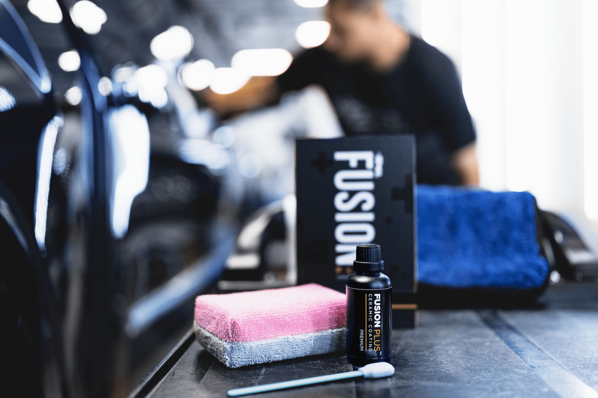 XPEL FUSION PLUS ceramic coating bottle and applicator at the Prestige Films shop
