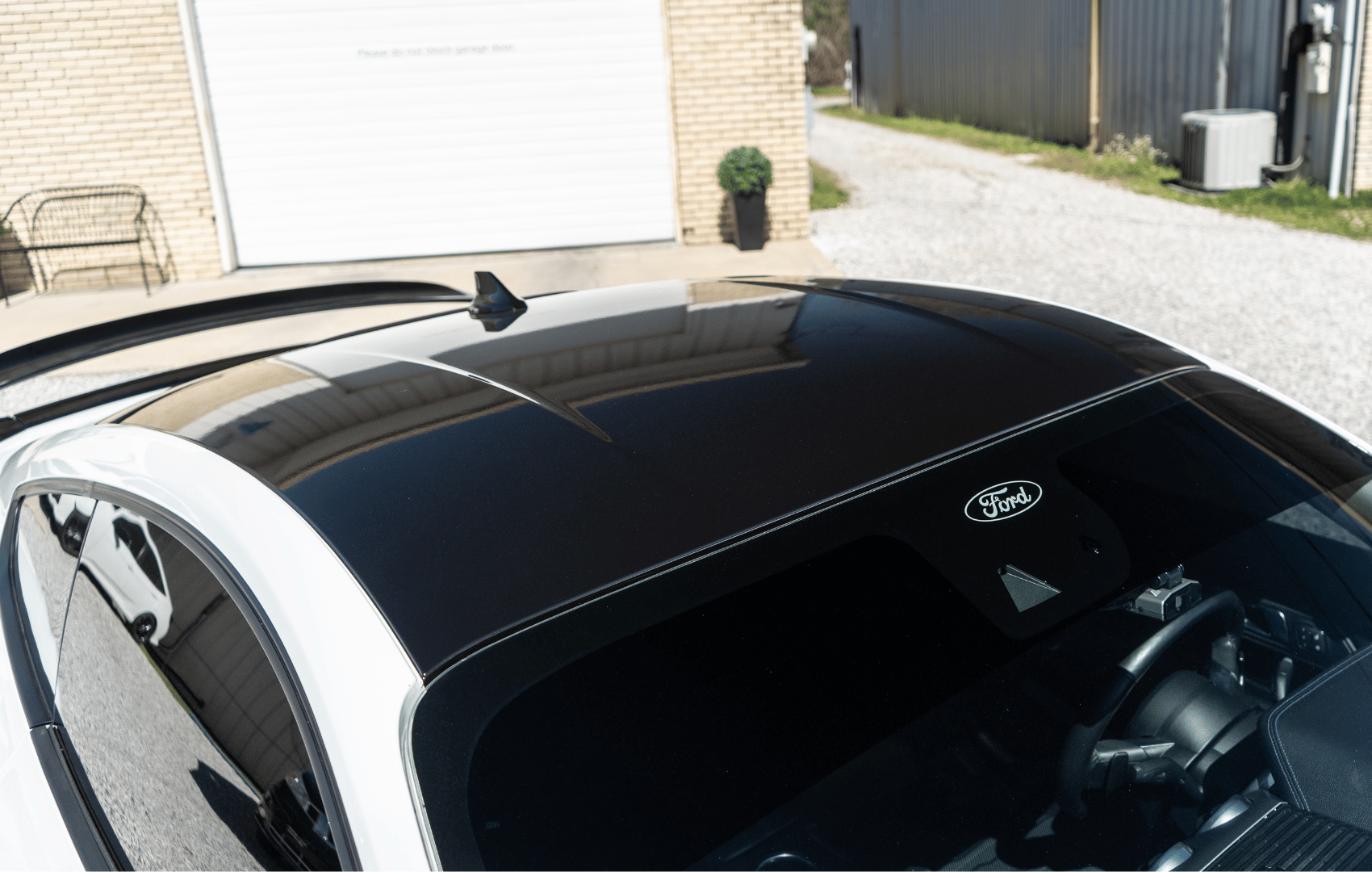 Single Color Vinyl Wrap - Prestige Films Ford with a gloss black vinyl roof wrap