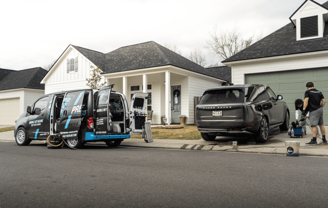 Prestige Films mobile detailing a car.