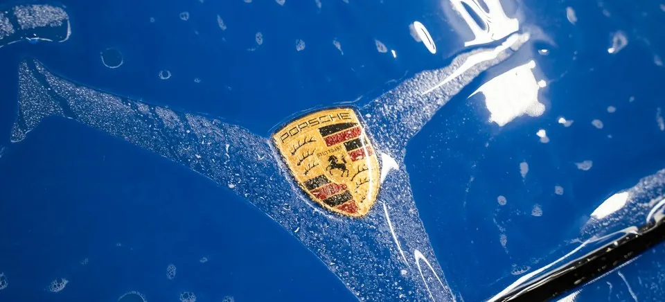 Paint protection film on a blue Porsche hood